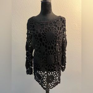 Crochet mini dress with bead details on front.